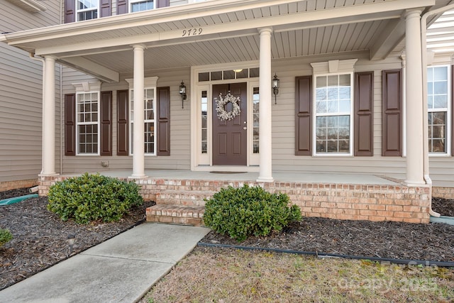 property entrance with a porch