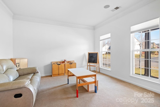 living room featuring carpet and ornamental molding