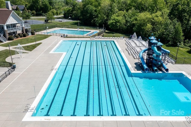 view of swimming pool featuring a patio