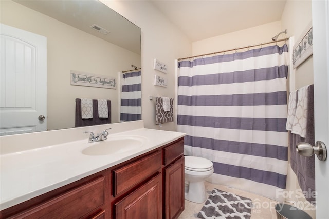 bathroom featuring tile patterned floors, vanity, toilet, and a shower with curtain