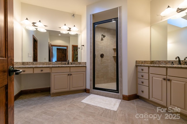 bathroom with vanity and walk in shower