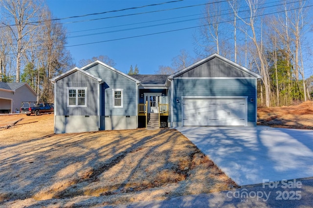 single story home featuring a garage