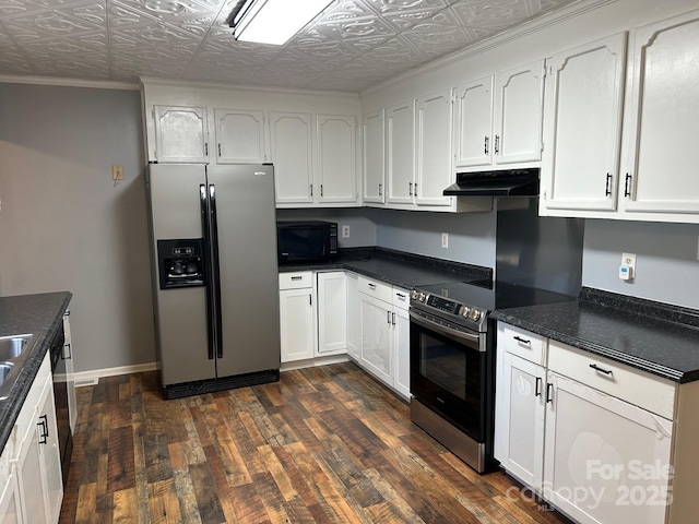 kitchen with white cabinets and appliances with stainless steel finishes