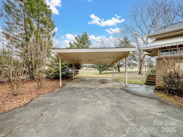 view of parking with a carport