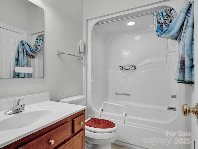 full bathroom with shower / bathing tub combination, vanity, and toilet