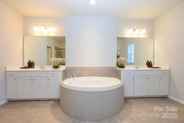 7542 Waverly Walk Ave Unit 7542, Charlotte, NC 28277 - full bath with a garden tub, two vanities, a stall shower, and a sink