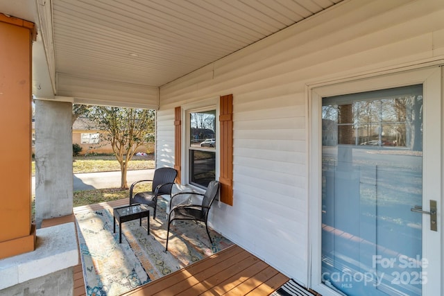 deck featuring covered porch