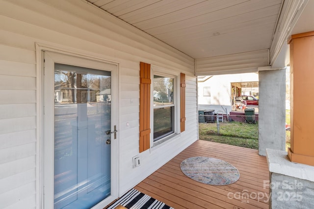 entrance to property featuring covered porch