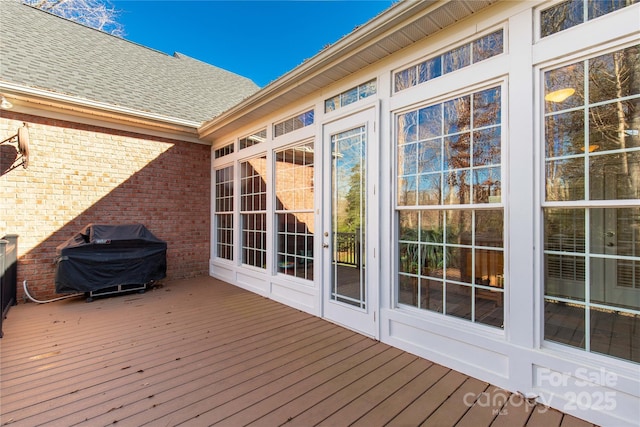 wooden terrace with grilling area