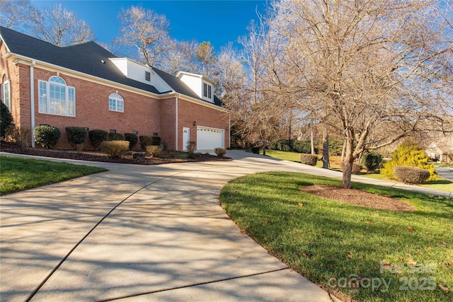 view of home's exterior featuring a garage and a lawn