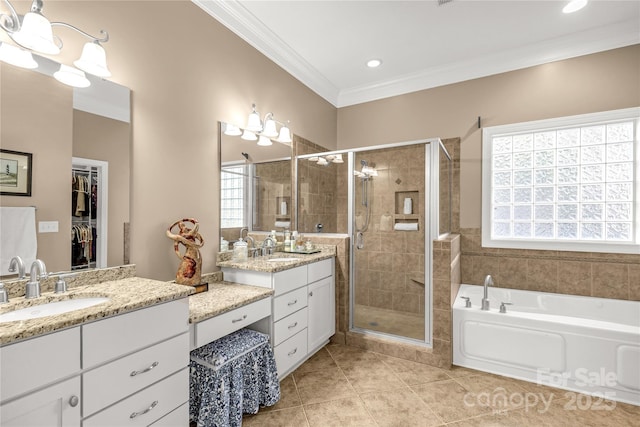 bathroom featuring tile patterned floors, vanity, ornamental molding, and plus walk in shower