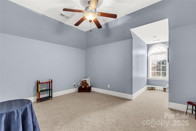 additional living space featuring carpet and ceiling fan