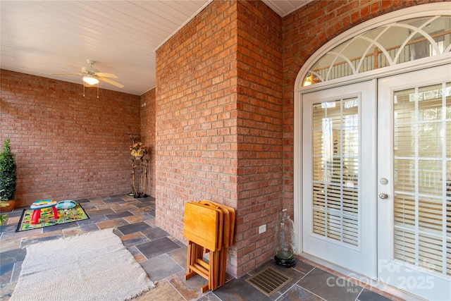 doorway to property featuring ceiling fan and french doors