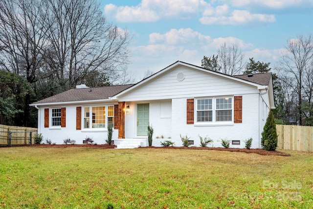 single story home featuring a front yard