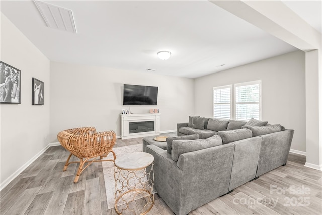 living room featuring light wood-type flooring