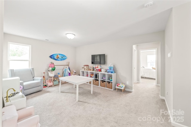 playroom featuring carpet flooring