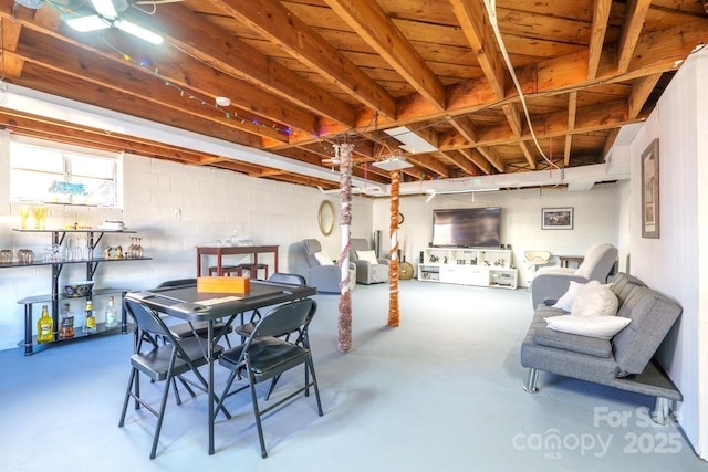 dining area featuring concrete floors