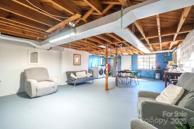 basement featuring washing machine and clothes dryer