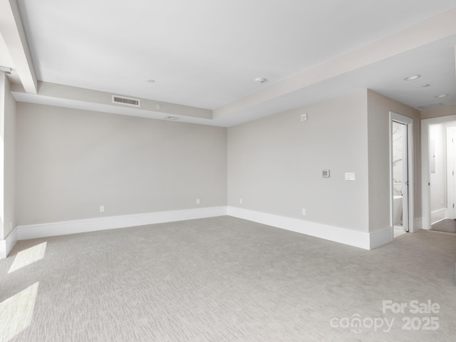 empty room featuring carpet flooring