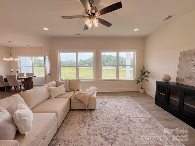46 Griffin Rd Unit 2, Pageland, SC 29728 - living area featuring a chandelier, baseboards, light wood finished floors, a ceiling fan, and recessed lighting