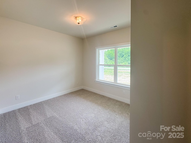 46 Griffin Rd Unit 2, Pageland, SC 29728 - carpeted empty room with baseboards