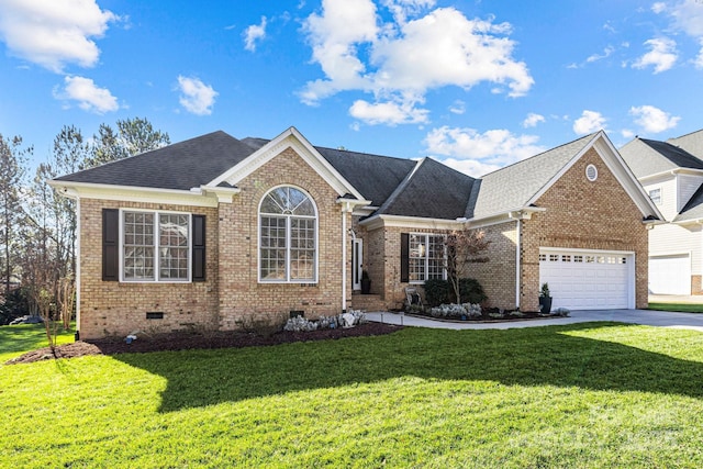 view of front property featuring a garage and a front yard