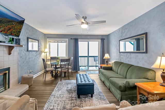 301 Pinnacle Inn Rd Unit 4313, Beech Mountain, NC 28604 - living area with plenty of natural light, wood finished floors, a ceiling fan, and a tiled fireplace