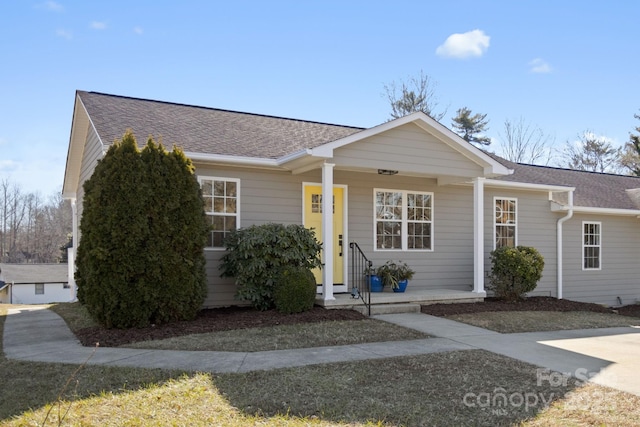 ranch-style house with a porch