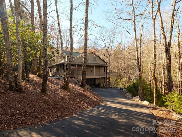 view of property exterior featuring a garage