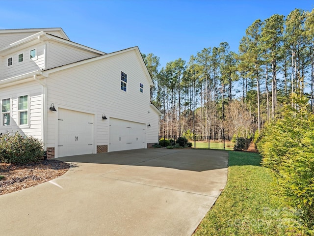 view of property exterior featuring a garage