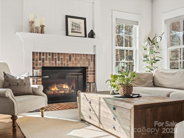 interior space featuring a brick fireplace