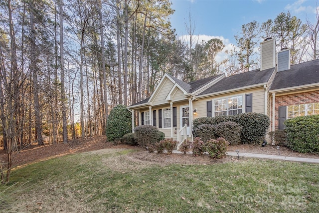 view of front of home with a front yard