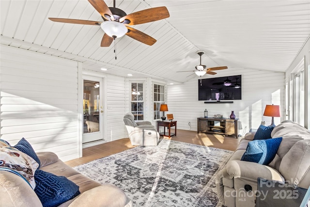 sunroom featuring lofted ceiling