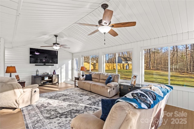 sunroom featuring wood ceiling and vaulted ceiling