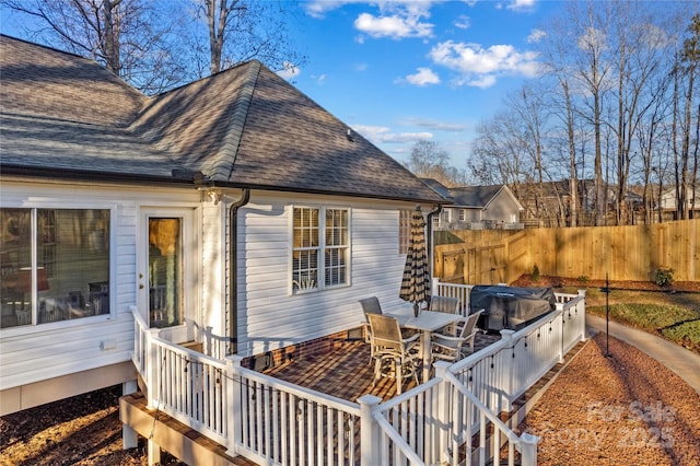 wooden terrace featuring area for grilling