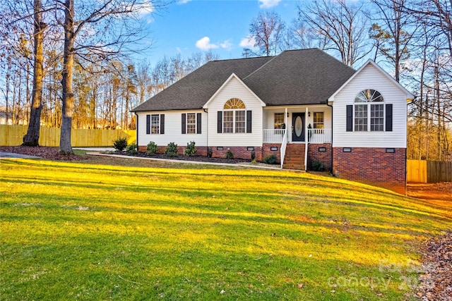 view of front of home featuring a front lawn and a porch