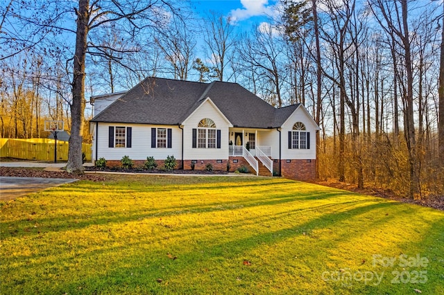 view of front of house featuring a porch and a front yard