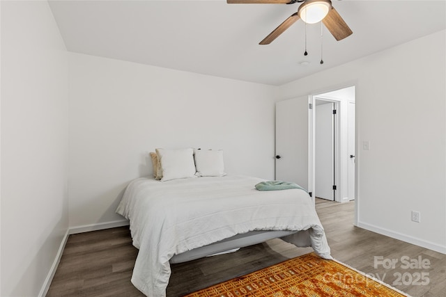 bedroom featuring ceiling fan and hardwood / wood-style flooring