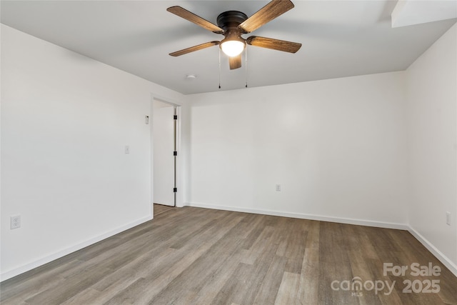 unfurnished room featuring ceiling fan and light wood-type flooring