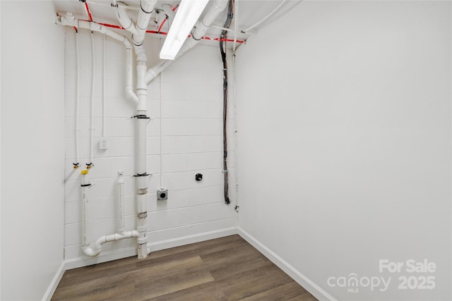 washroom featuring dark wood-type flooring