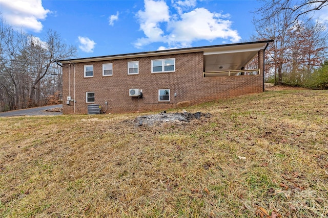 view of property exterior with a yard