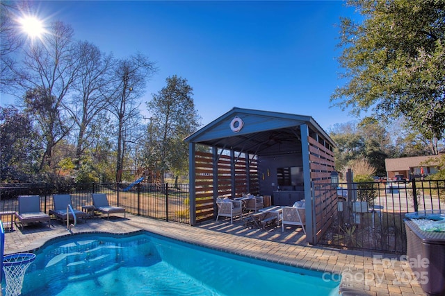 view of swimming pool with a gazebo, a playground, and a patio