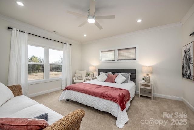 carpeted bedroom with crown molding and ceiling fan