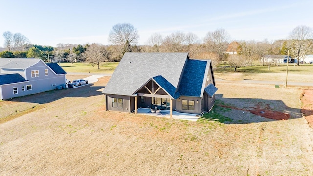 rear view of house with a patio area