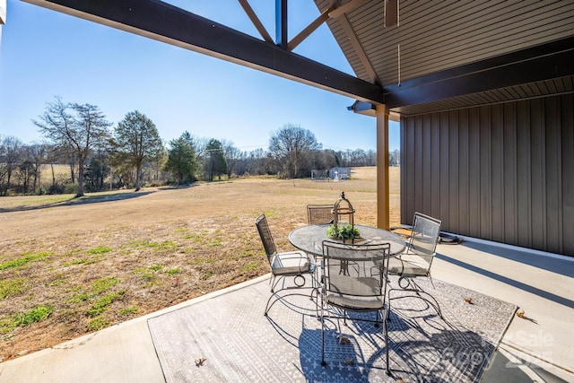 view of patio with a rural view