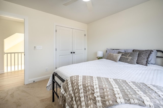 bedroom featuring carpet floors, ceiling fan, and a closet