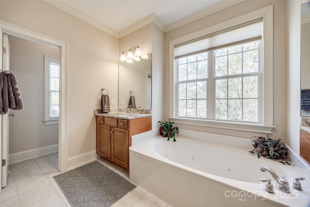 bathroom with crown molding, tile patterned floors, vanity, and a tub