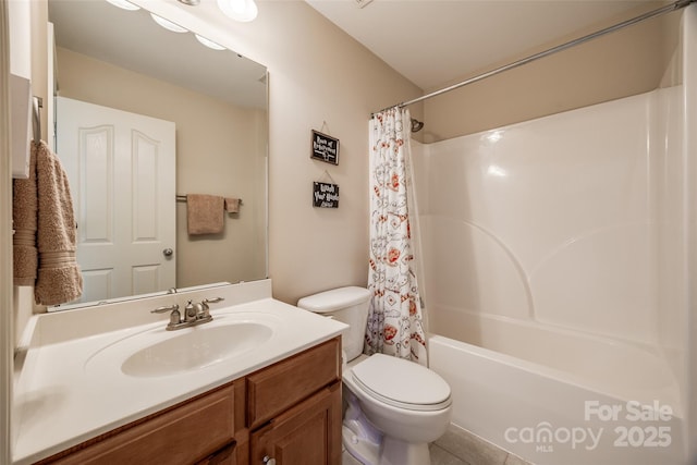 full bathroom featuring shower / tub combo with curtain, vanity, and toilet