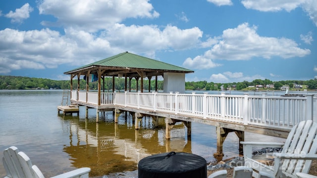 dock area with a water view