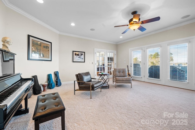 living area with recessed lighting, carpet, crown molding, and ceiling fan